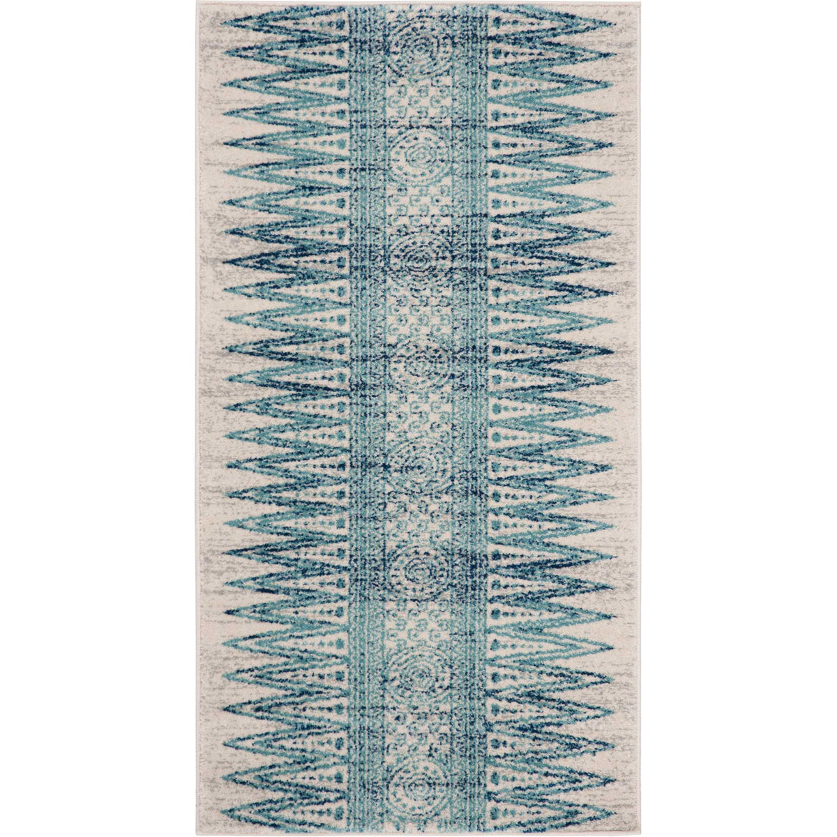 Small ivory and turquoise accent rug pairs layered medallions with bold, jagged motifs.