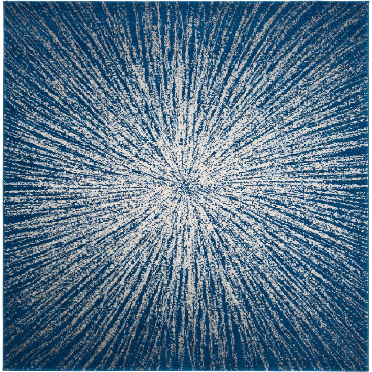 A square navy and ivory area rug spreads a brilliant starburst from its center to every edge. || EVK228N-9SQ || top_studio