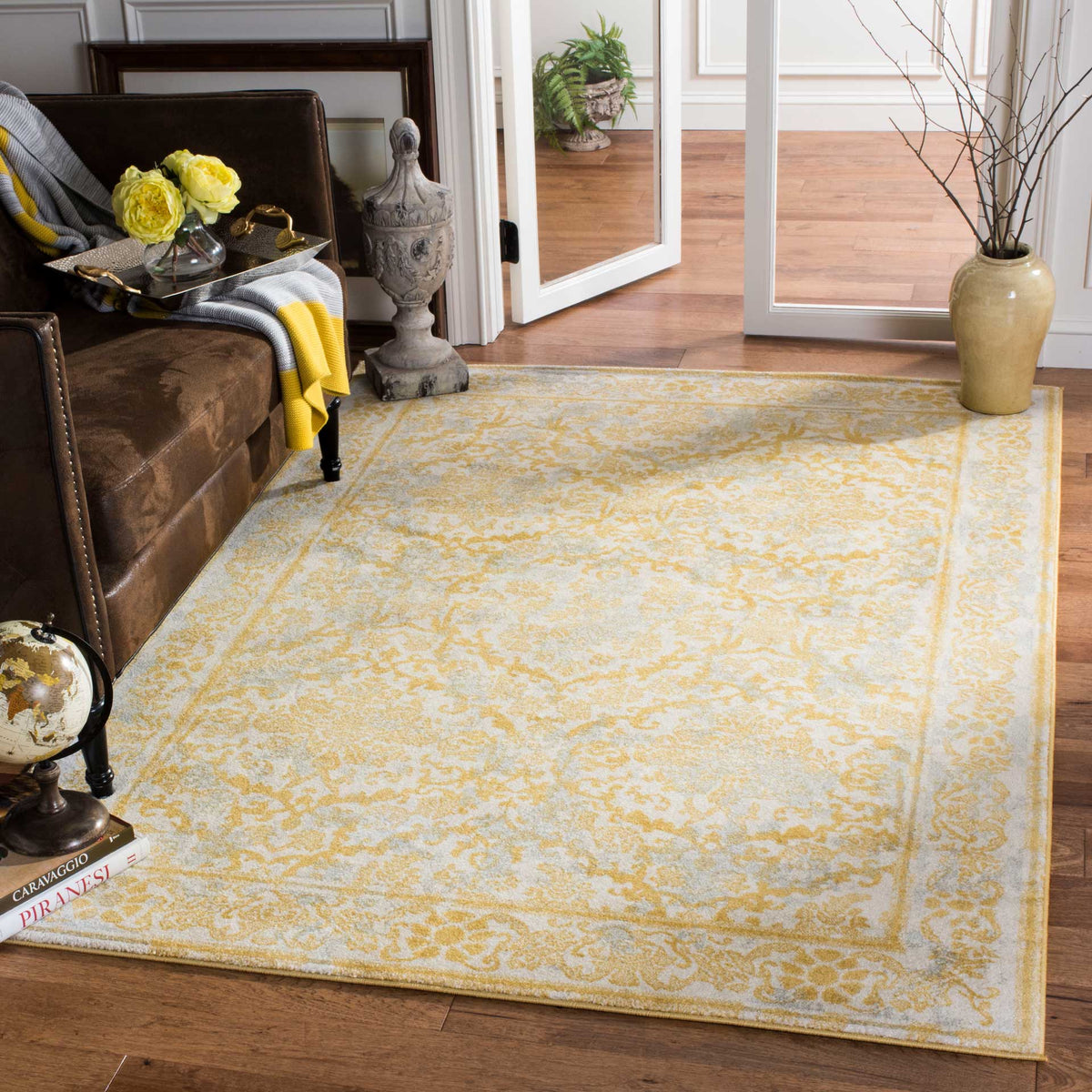 Ivory and gold floral motifs and a decorative border bring warmth to a living space