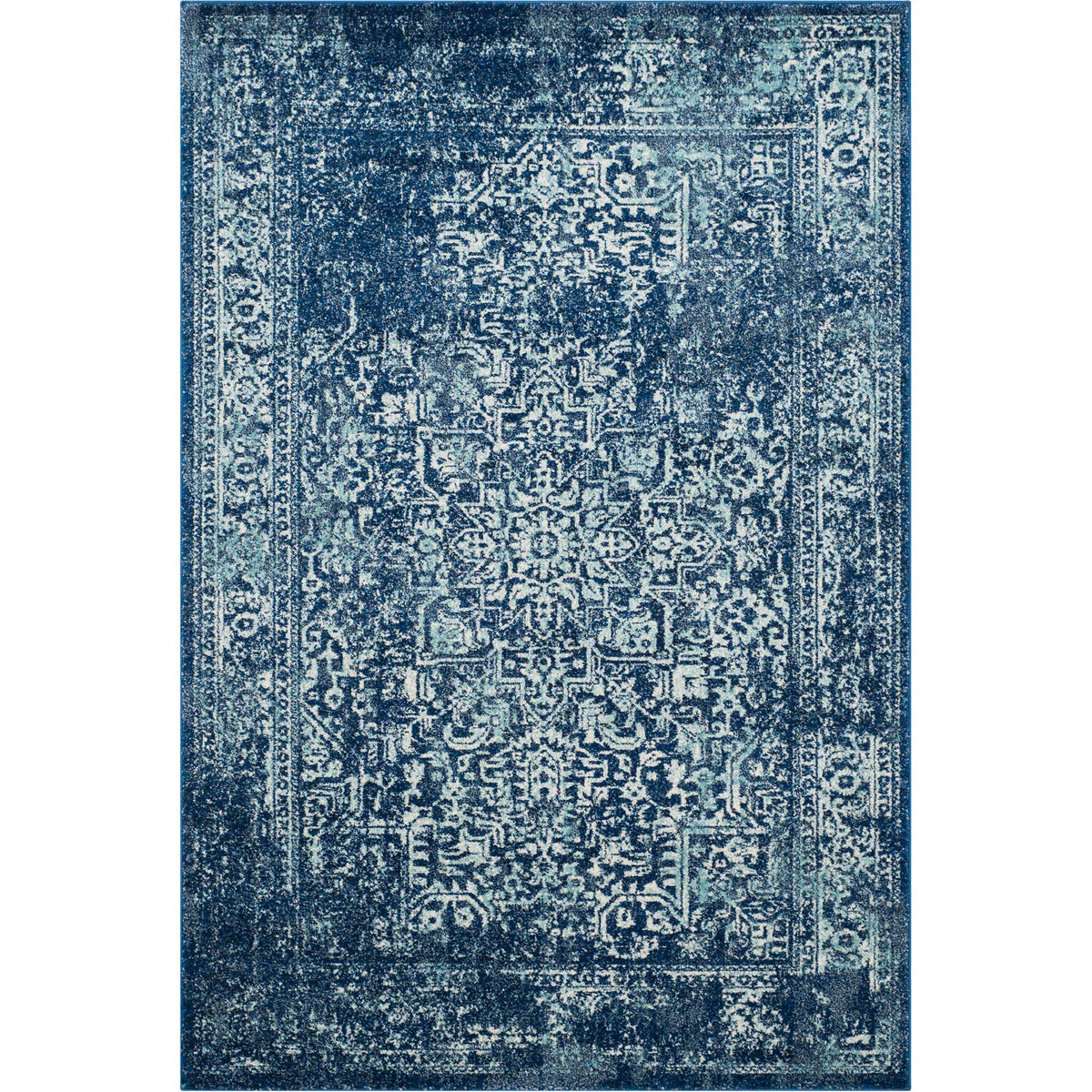 Navy and ivory rectangular rug pairs intricate floral motifs with distressed texture