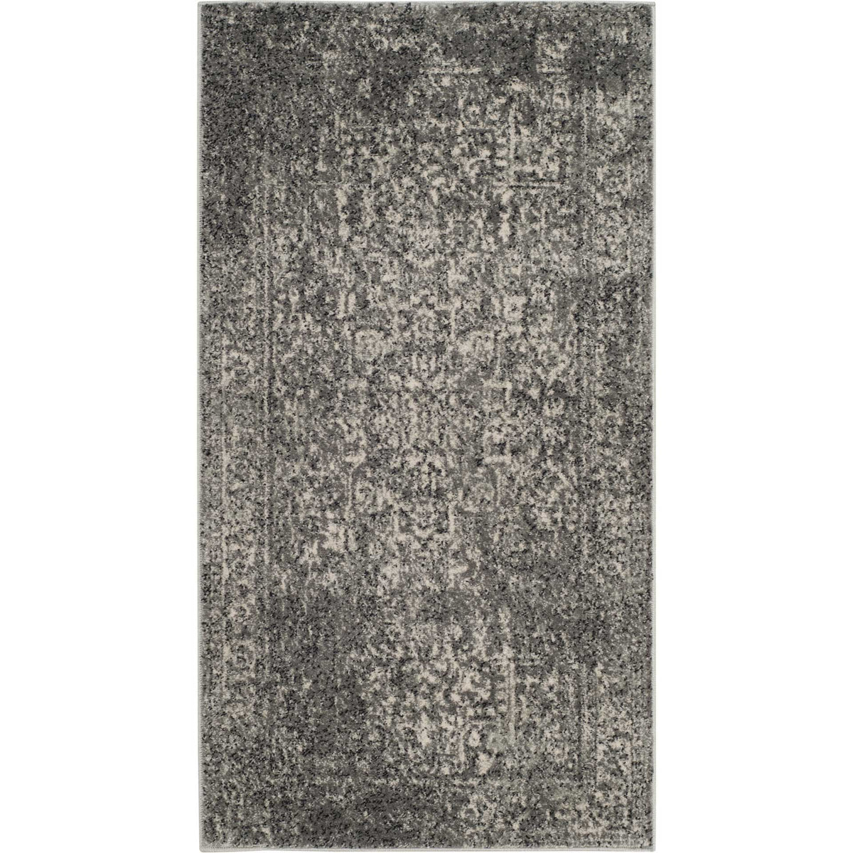 Small gray and ivory accent rug with subtle faded floral motifs