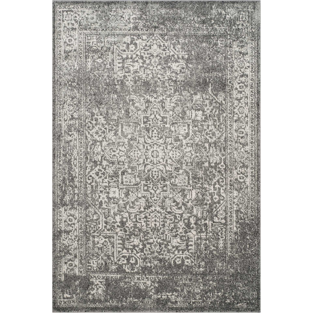 Gray and ivory area rug balances an intricate central motif with vintage-inspired fading