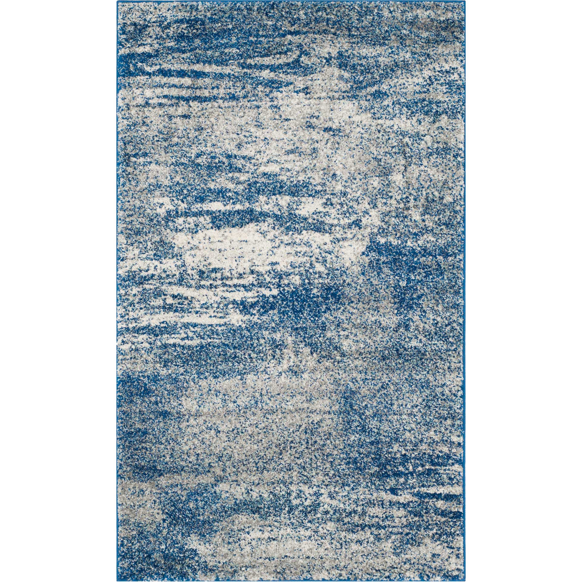 An abstract navy and ivory rug blends deep blue bands with an artfully distressed surface.
