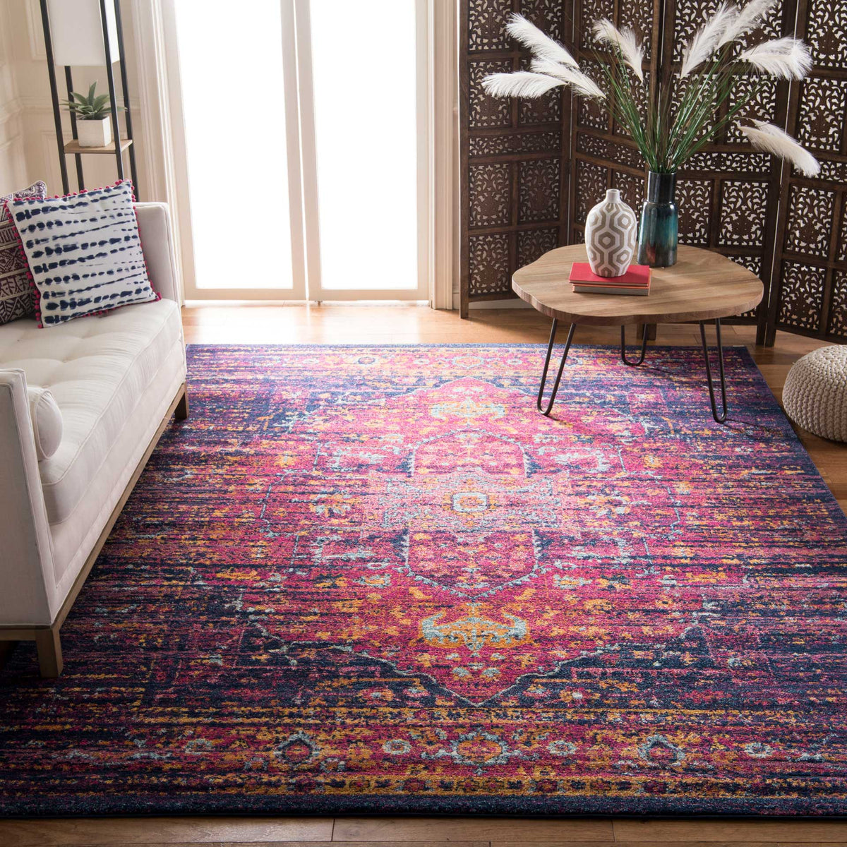 Vibrant fuchsia and blue add a bold, vintage-inspired foundation to a bright living space.