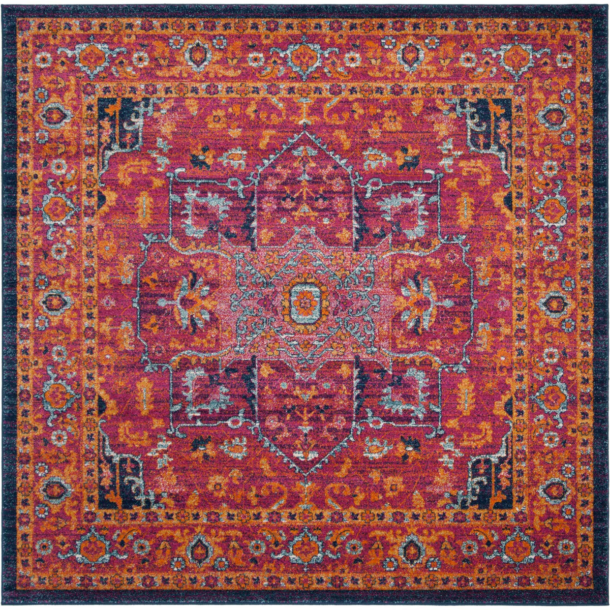 A square rug glows with fuchsia and orange florals, framed by intricate dark blue detailing.