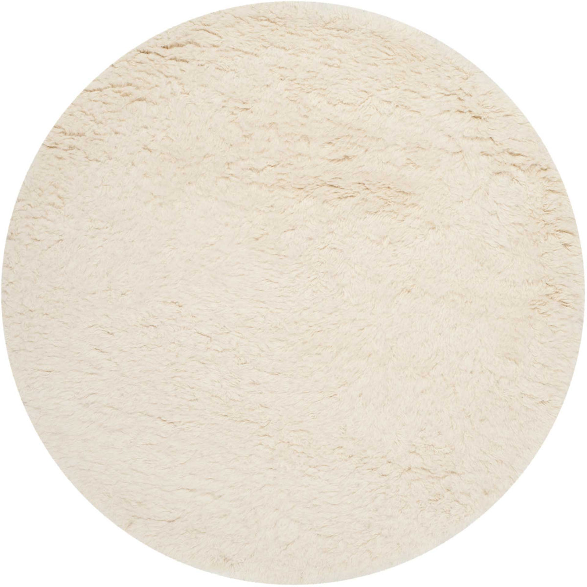 Soft ivory wool fibers create a fluffy, textured round rug.