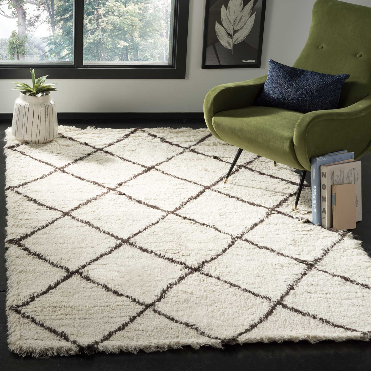 A cozy ivory shag rug with brown diamond lines brings texture beneath a green armchair