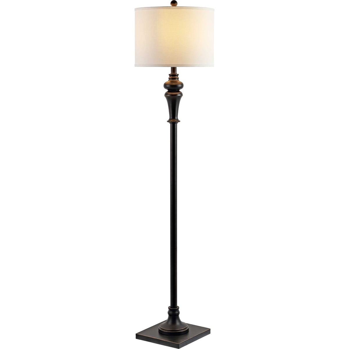 Warm light glows through the off-white drum shade above a slender black iron stem