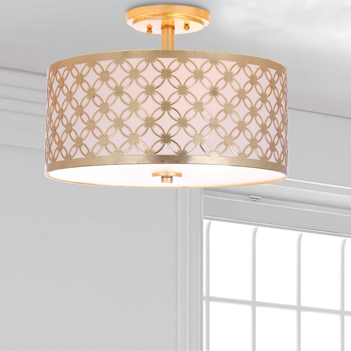 A glowing gold lattice shade lends soft, welcoming light to the room