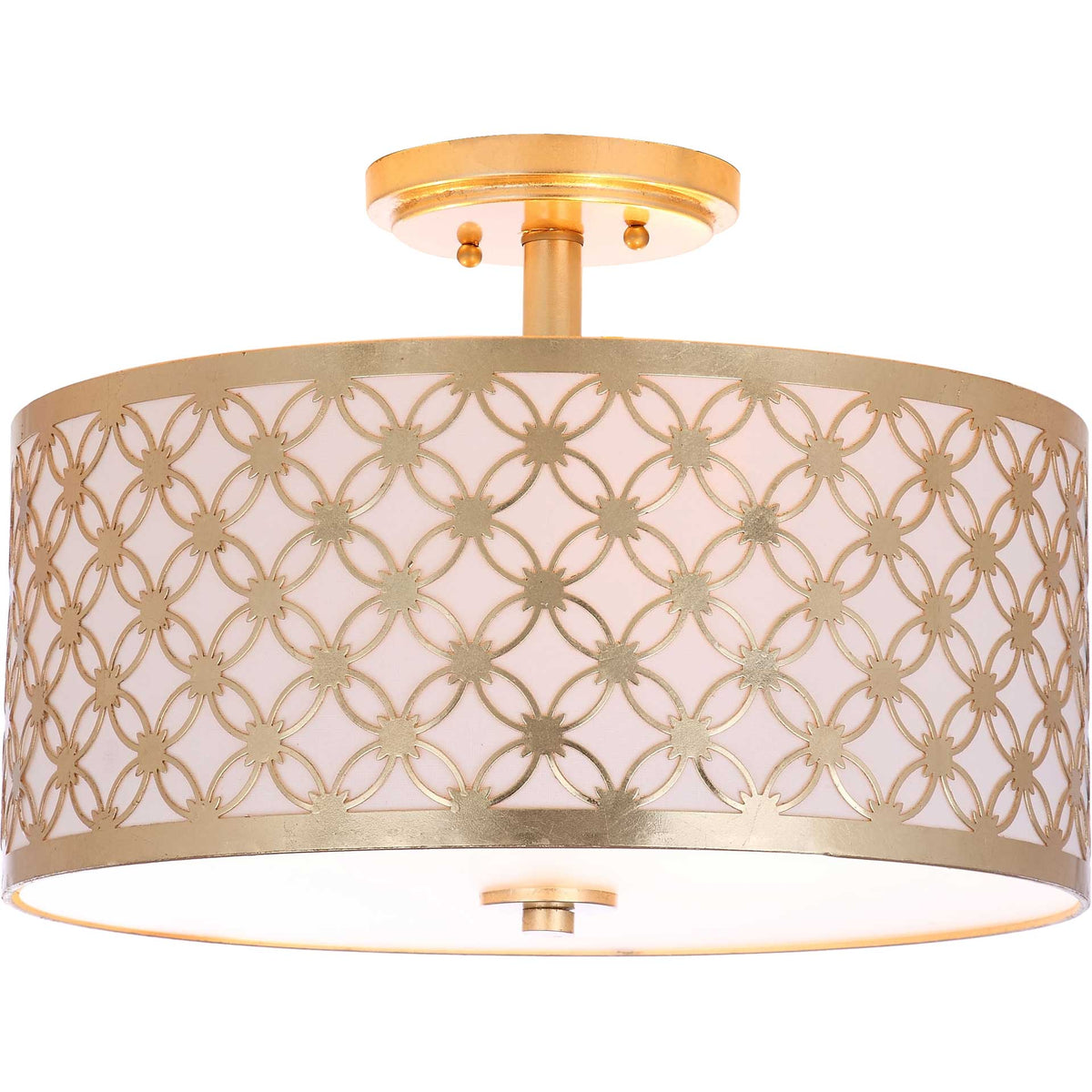 Warm light glows through the gold petal-patterned shade and off-white fabric