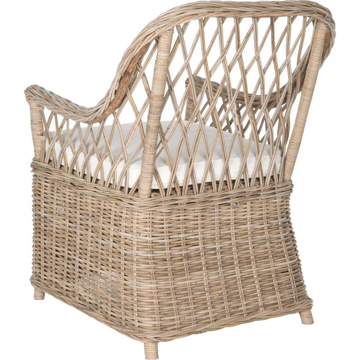 Open rattan latticework sweeps into curved arms above a tightly woven base