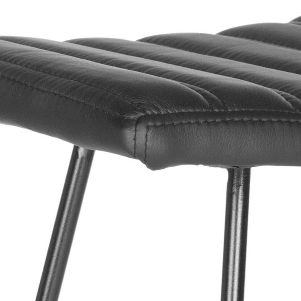 Plush stitched channels and a cleanly finished seam give the black seat textured appeal.
