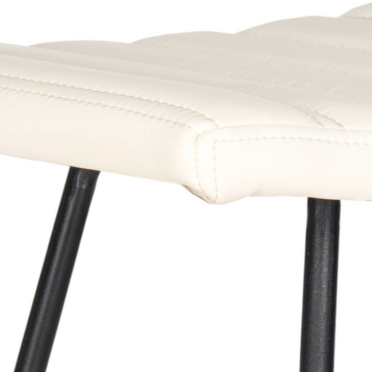 Stitched channels and a softly rounded edge add texture to the cream upholstered seat.