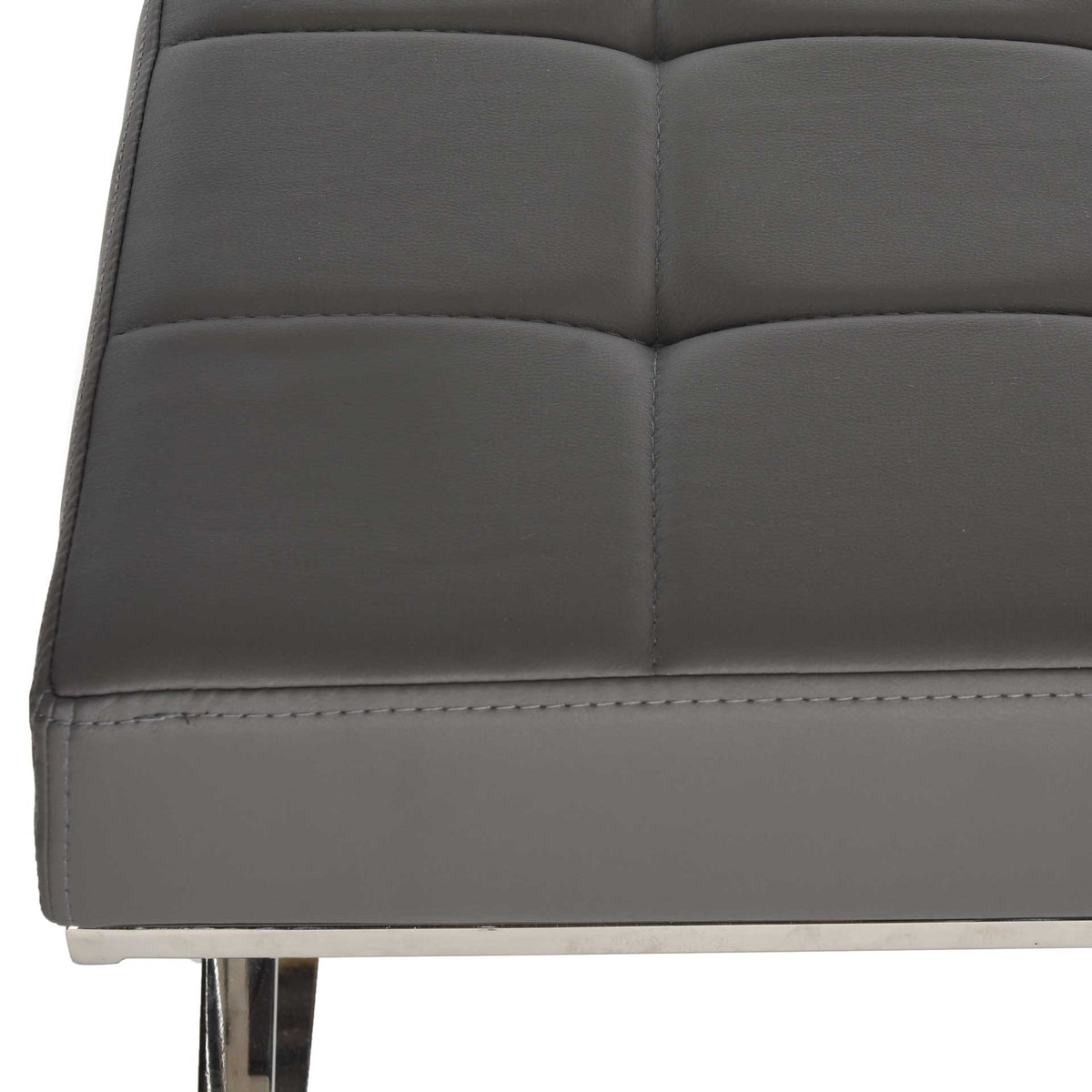 Square tufting and precise stitching give the gray cushioned seat a tailored finish.