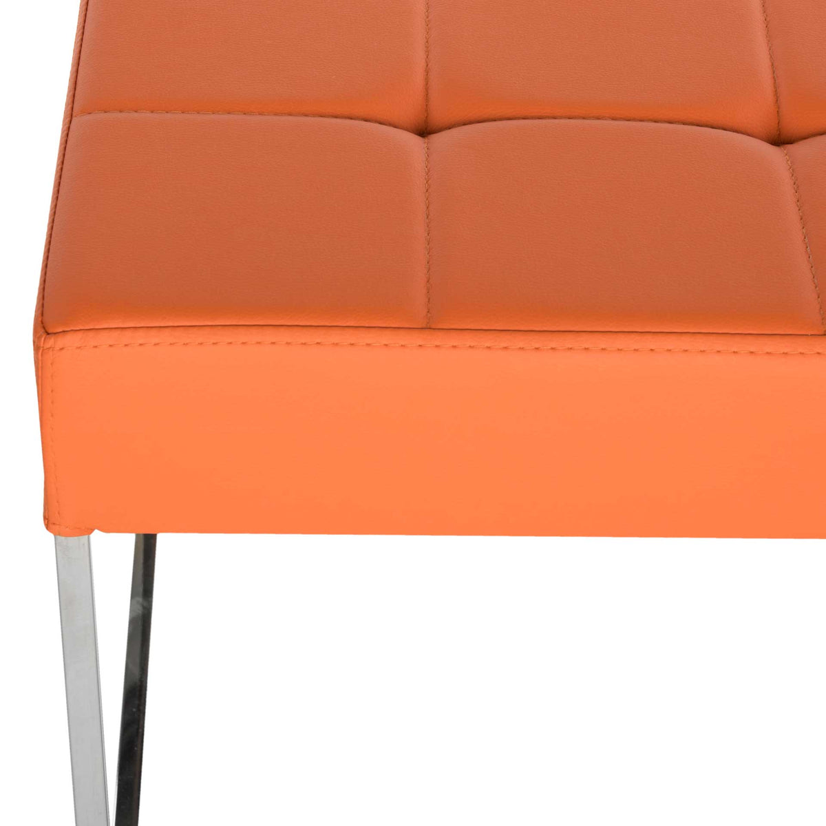 Orange faux leather upholstery with grid stitching and a smooth cushioned edge