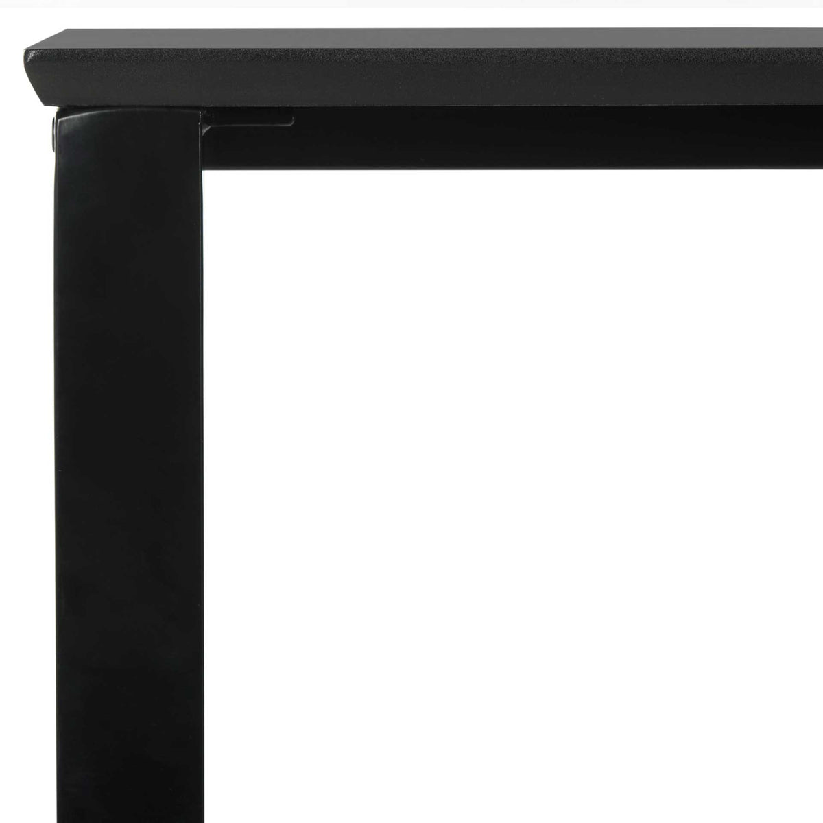 A thin black desktop edge sits just above a straight metal support