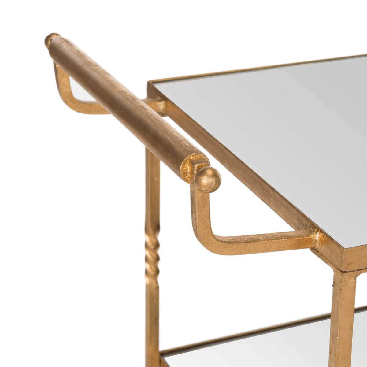 A curved gold handle offers an elegant grip beside the cart's mirrored top.