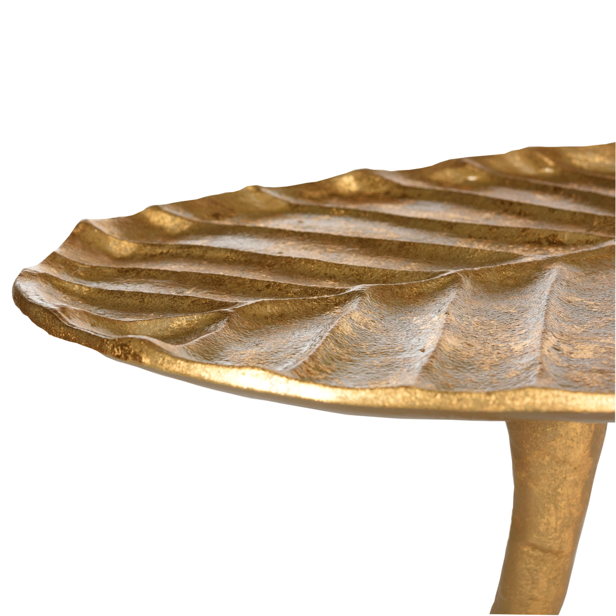 Raised veins and a rippled edge lend organic texture to the gold leaf tabletop.