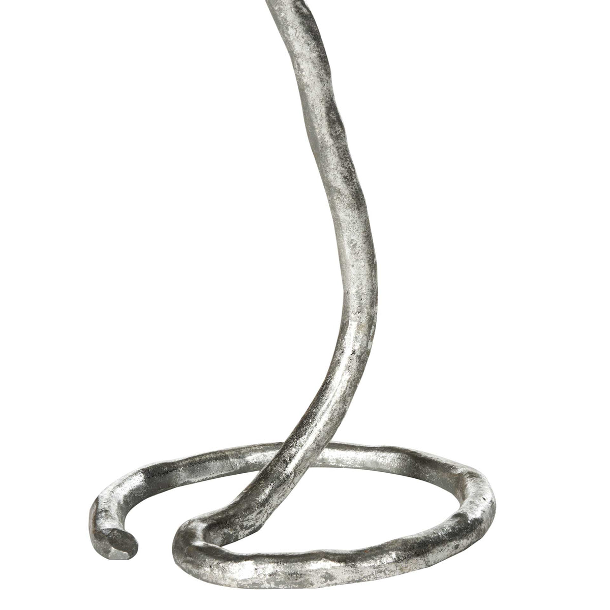 The textured silver stem sweeps into an open circular base with a graceful organic curve.