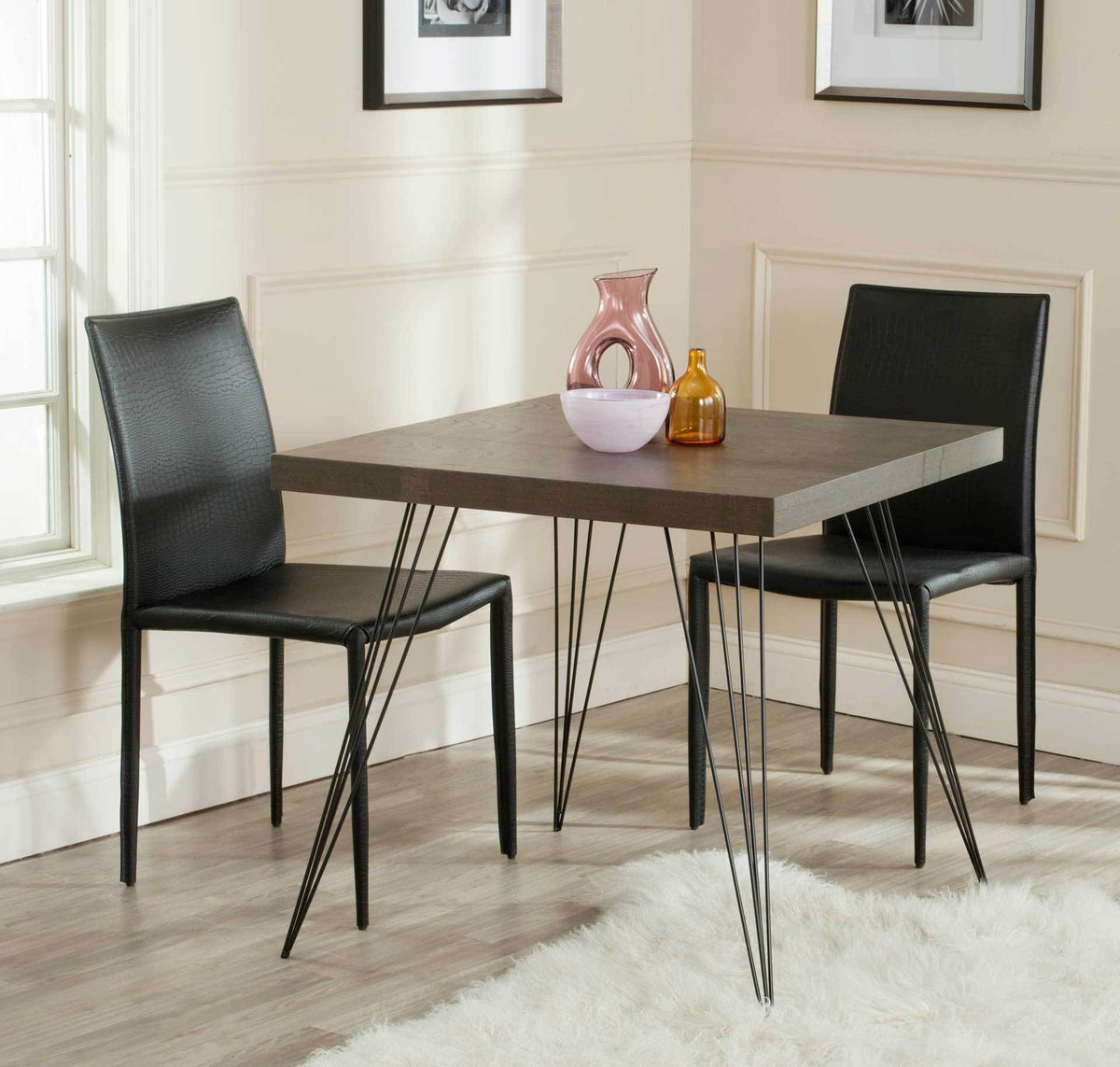 Dark brown square table with airy black hairpin legs adds warmth to a dining nook