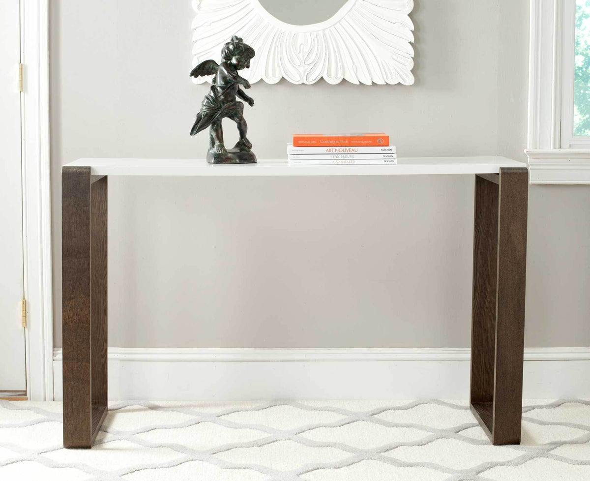 White console table with dark brown frame legs offers space for decorative accents