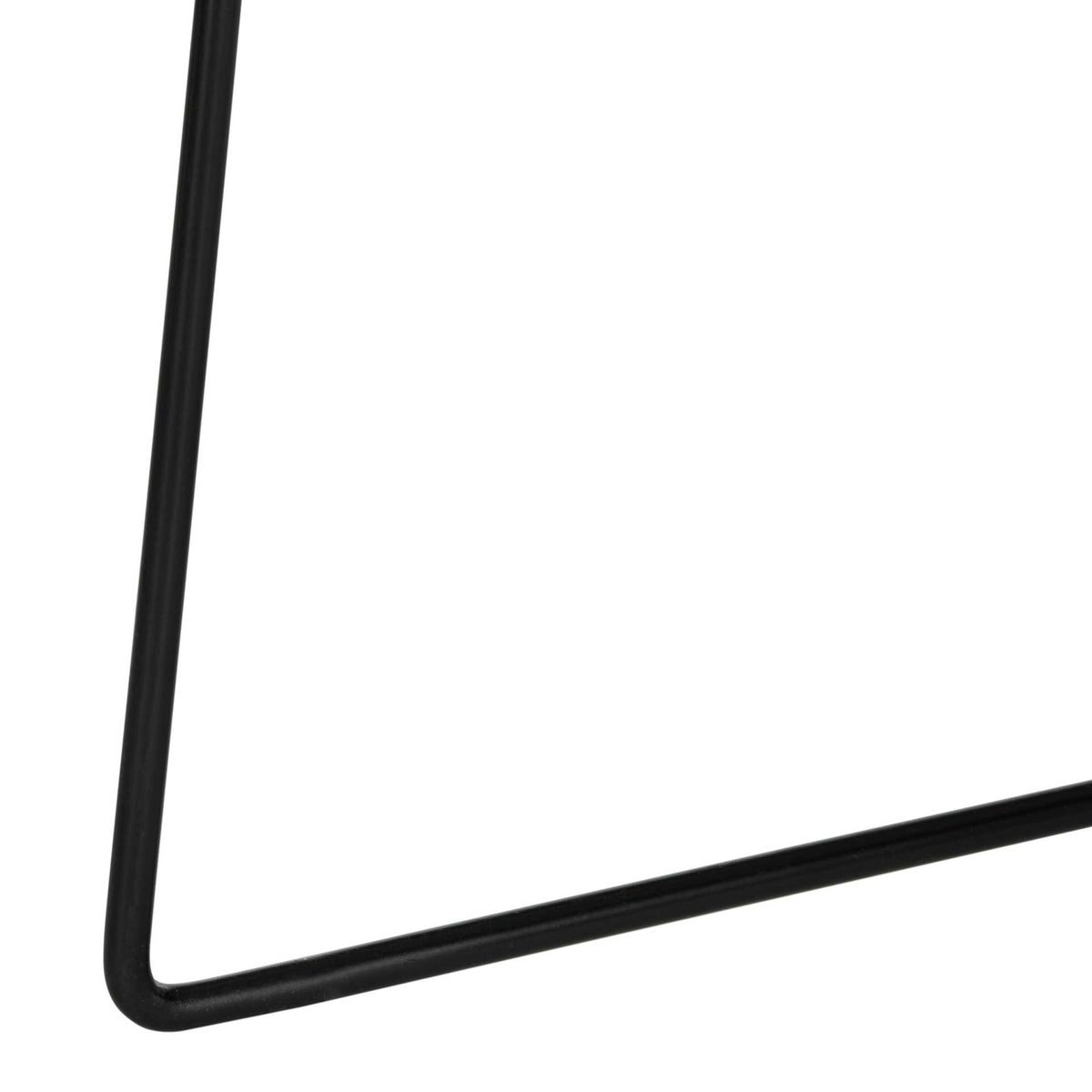 The slender black iron base has an angular foot with a softly rounded corner.