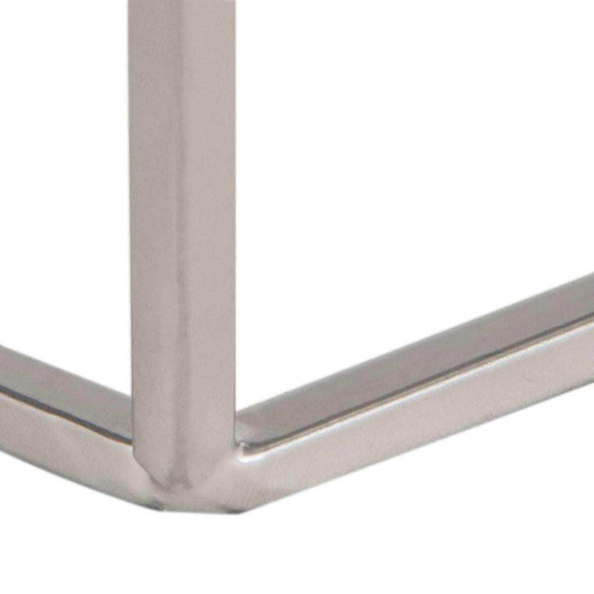 Silver metal bars meet at a sturdy corner of the table's open geometric base.
