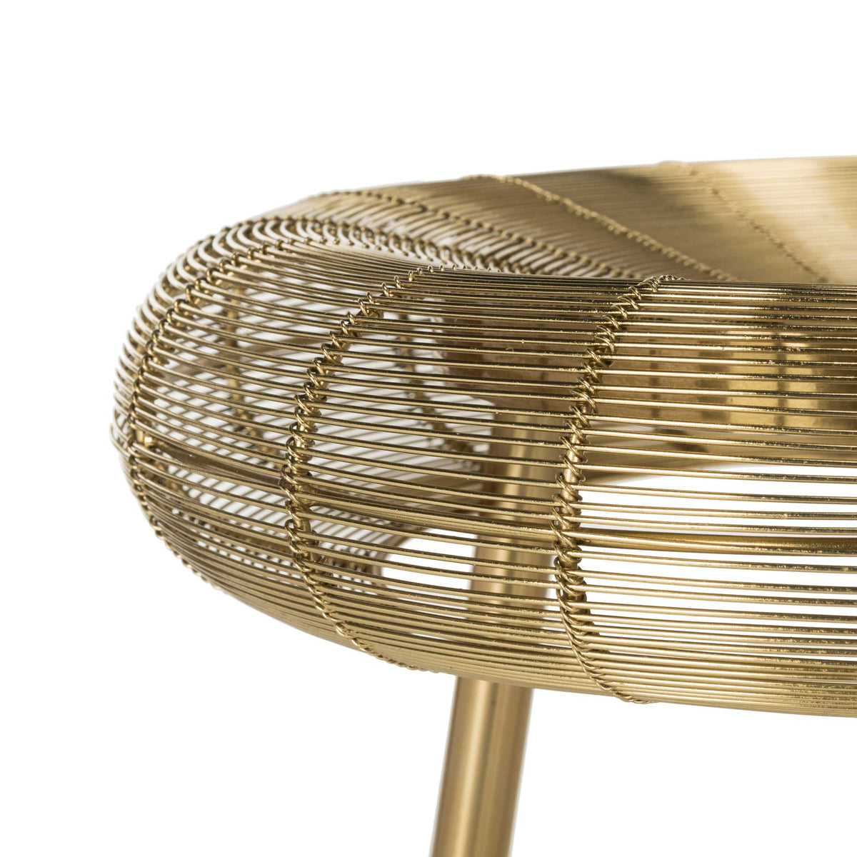 Fine gold metal strands curve around the thick seat rim, creating an open, layered weave.