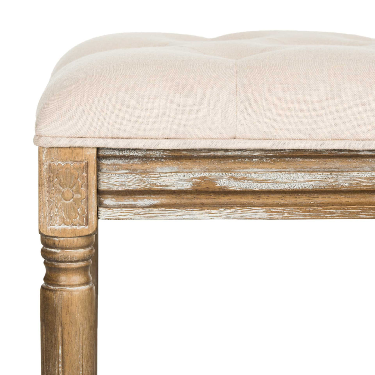 Beige linen meets weathered wood trim and a delicately carved corner block