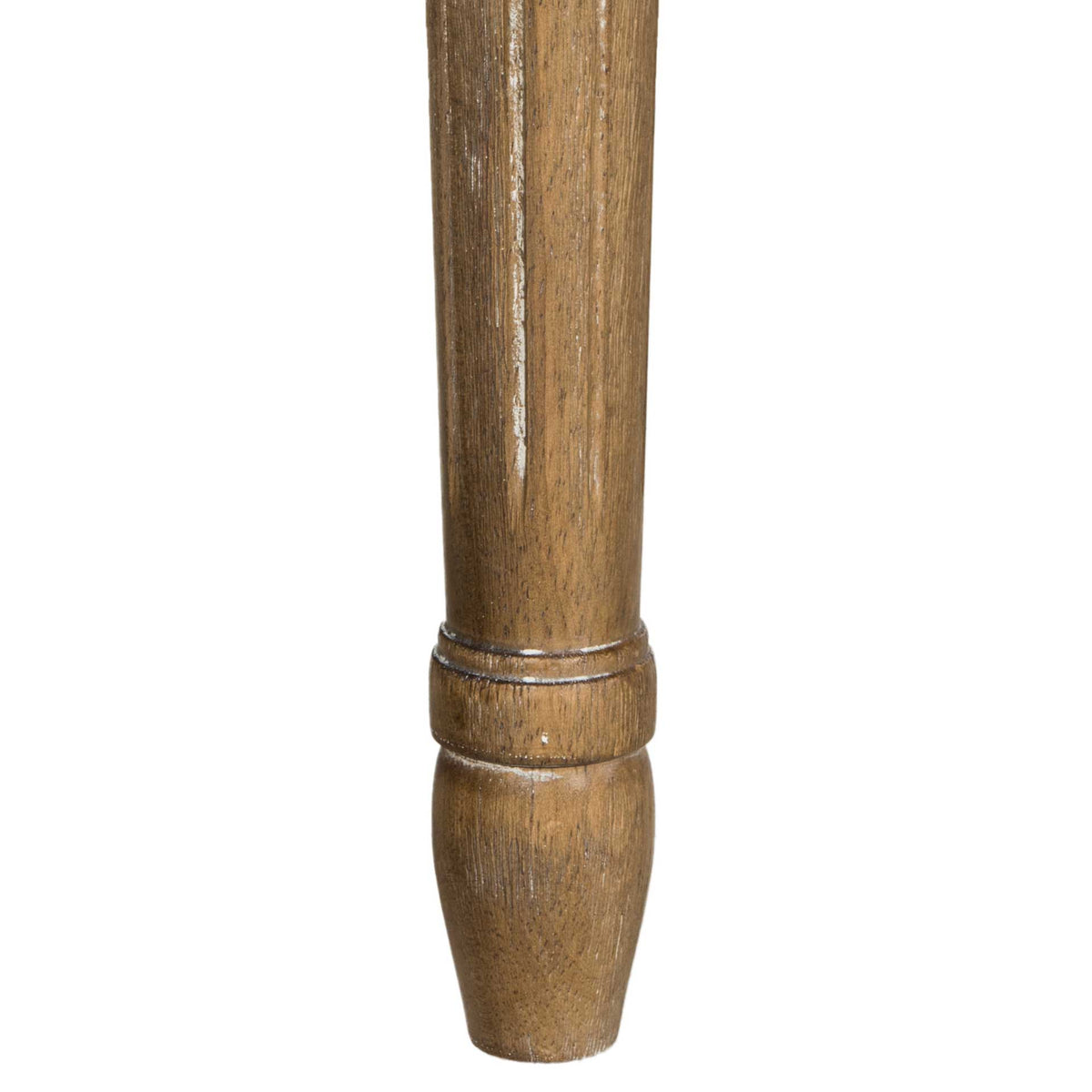 A tapered, turned wood leg displays warm grain and a gently distressed finish