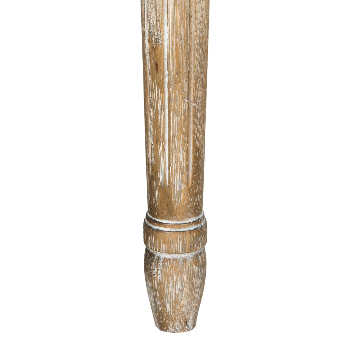 A warm wood leg has a whitewashed, distressed finish and a rounded, turned foot