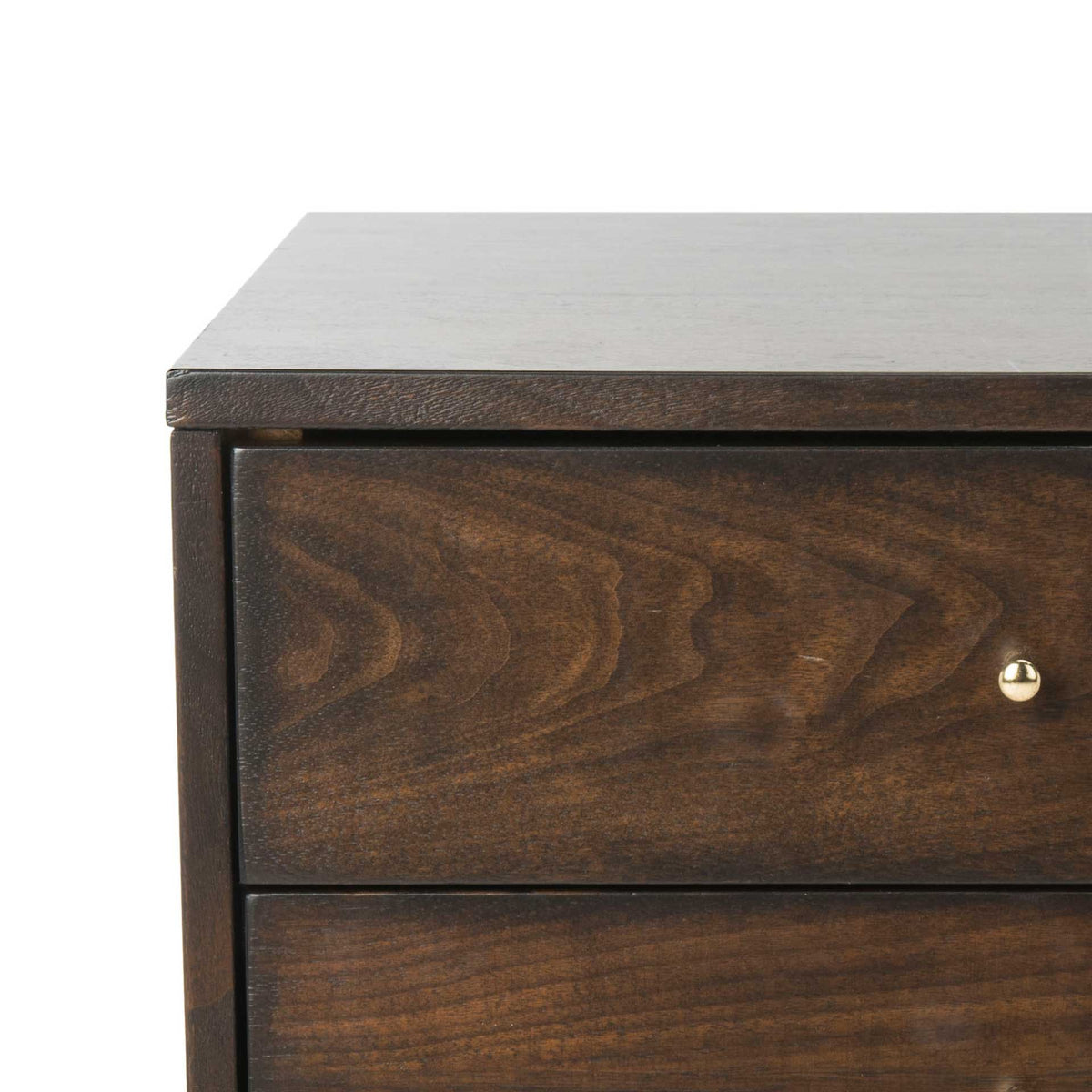 Curving wood grain lends depth to the walnut finish and inset drawer front