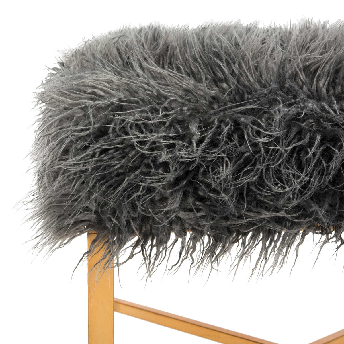 Soft, shaggy gray faux sheepskin adds plush texture above a warm gold-finish frame.