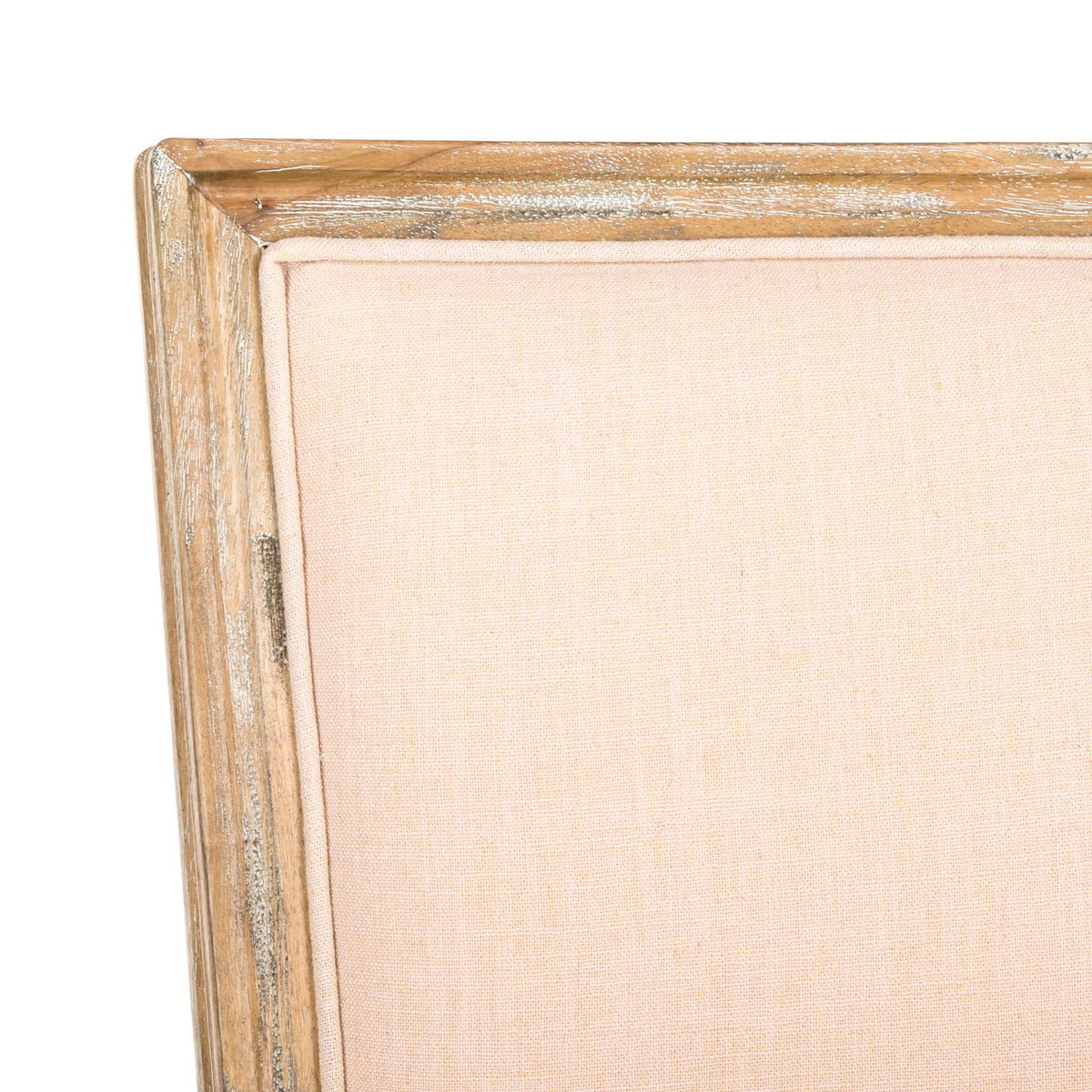 The beige linen backrest sits inside a rustic oak frame with richly textured grain.