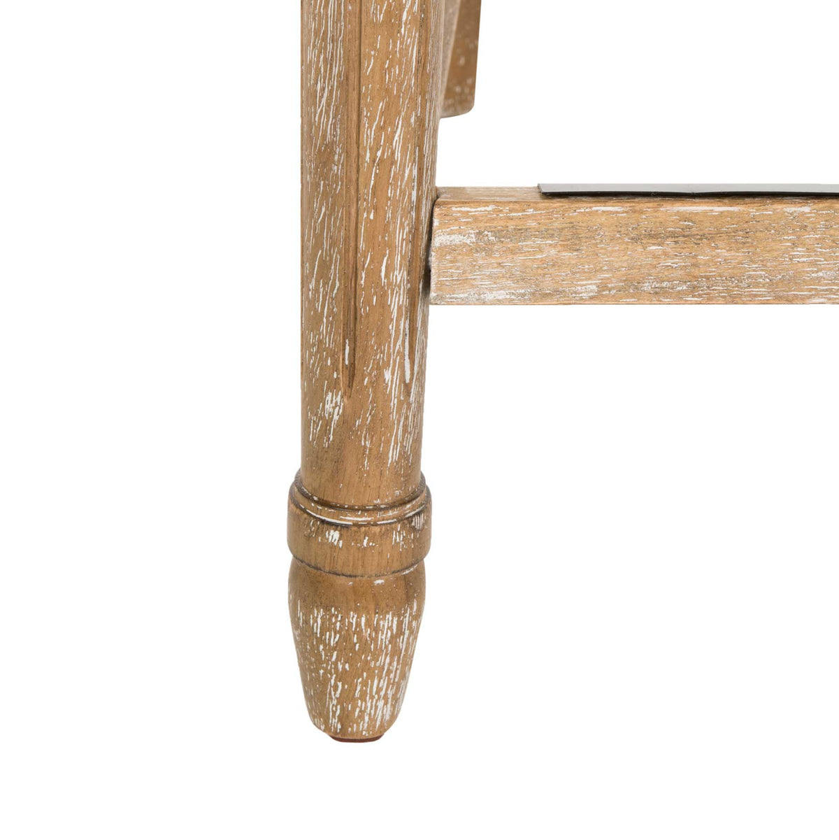 A turned oak foot and reinforced wood footrail show off the stool's rustic finish.