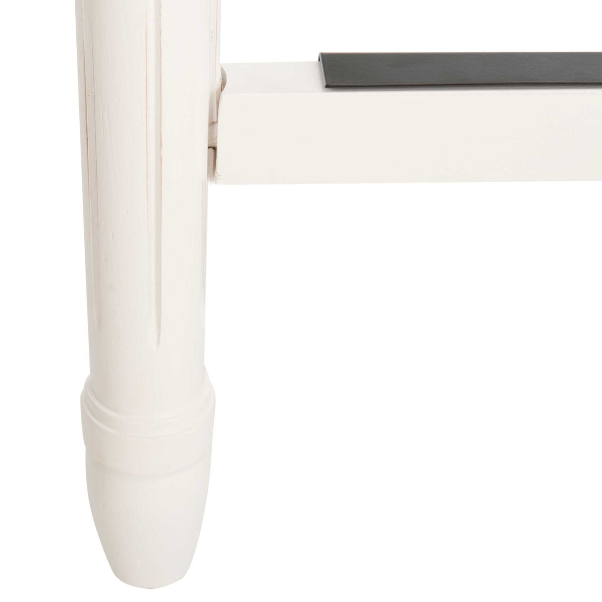The turned white leg and metal-topped footrail add comfort and durability.