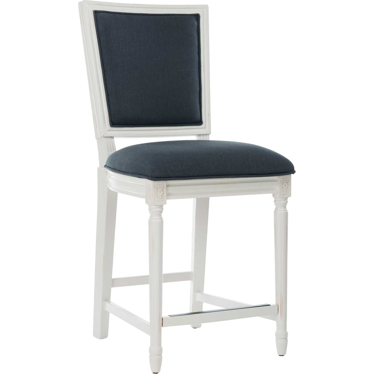 Navy linen cushions a counter stool with a rectangular back and a distressed white frame.
