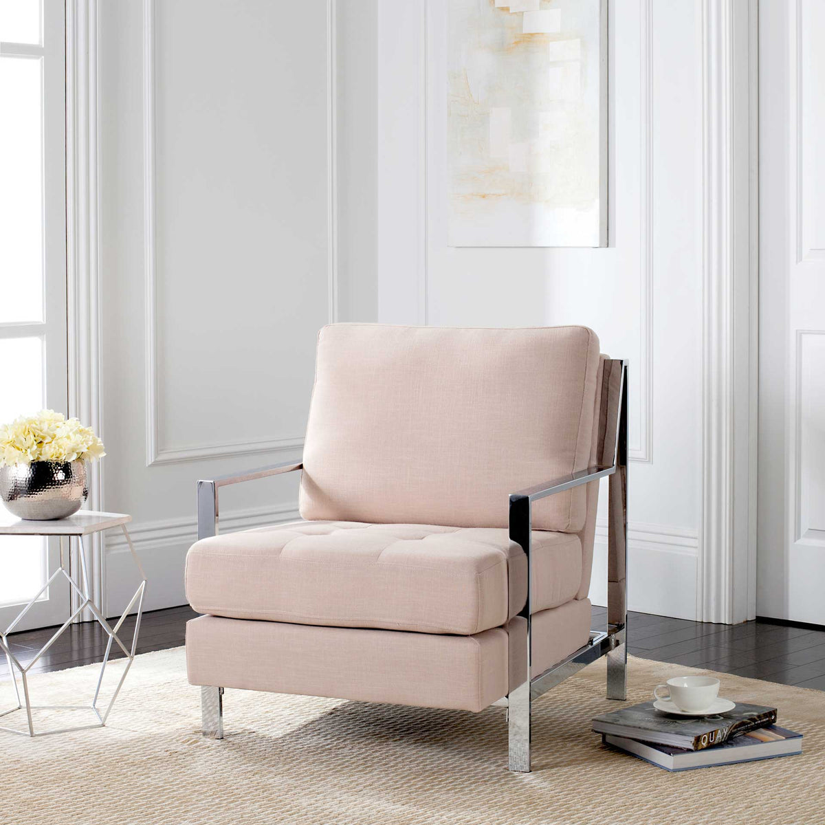 A tufted beige seat and gleaming chrome frame bring airy contemporary style to a living space