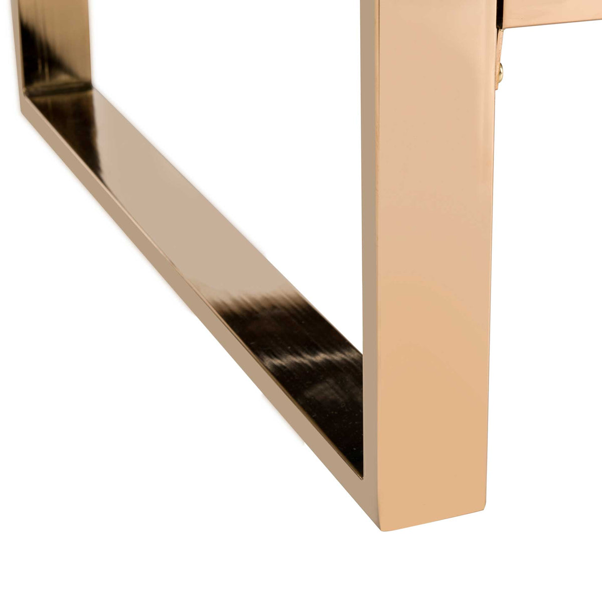 Polished brass-tone metal forms a sturdy rectangular leg and open sled-style base