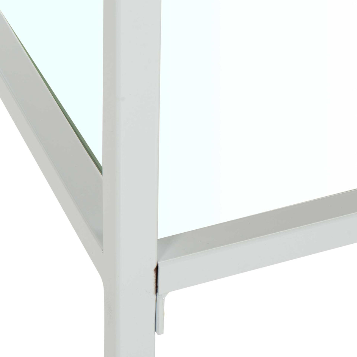 A clear glass shelf fits into a white metal frame with neatly joined supports.