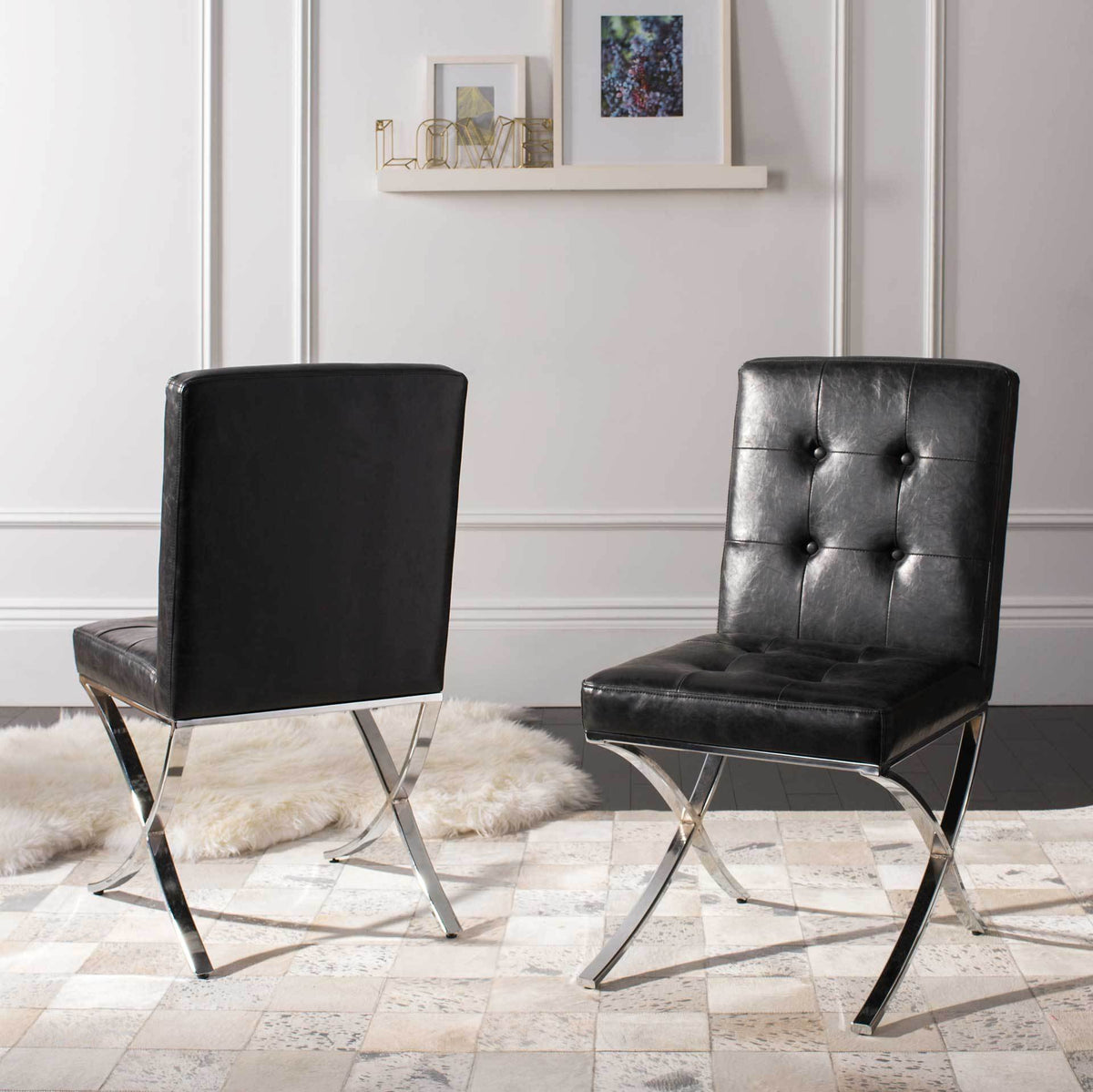 A black tufted side chair adds sleek texture and gleaming chrome curves to an airy interior