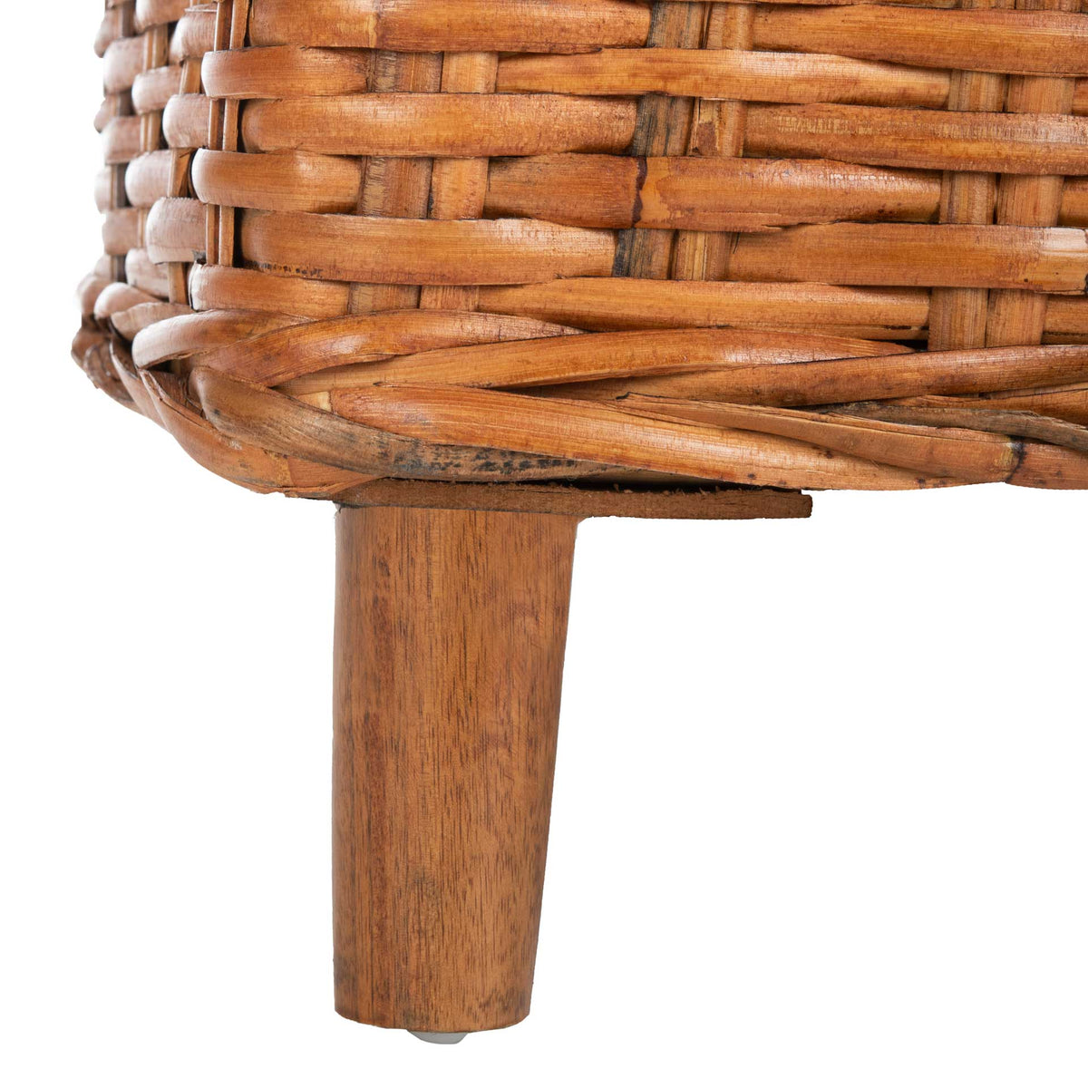 A tapered wooden leg shows warm grain beneath the tightly woven honey rattan base.