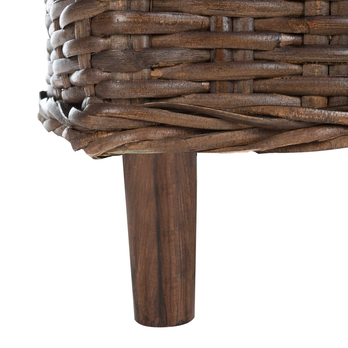 A solid brown wooden leg supports the richly woven rattan base.