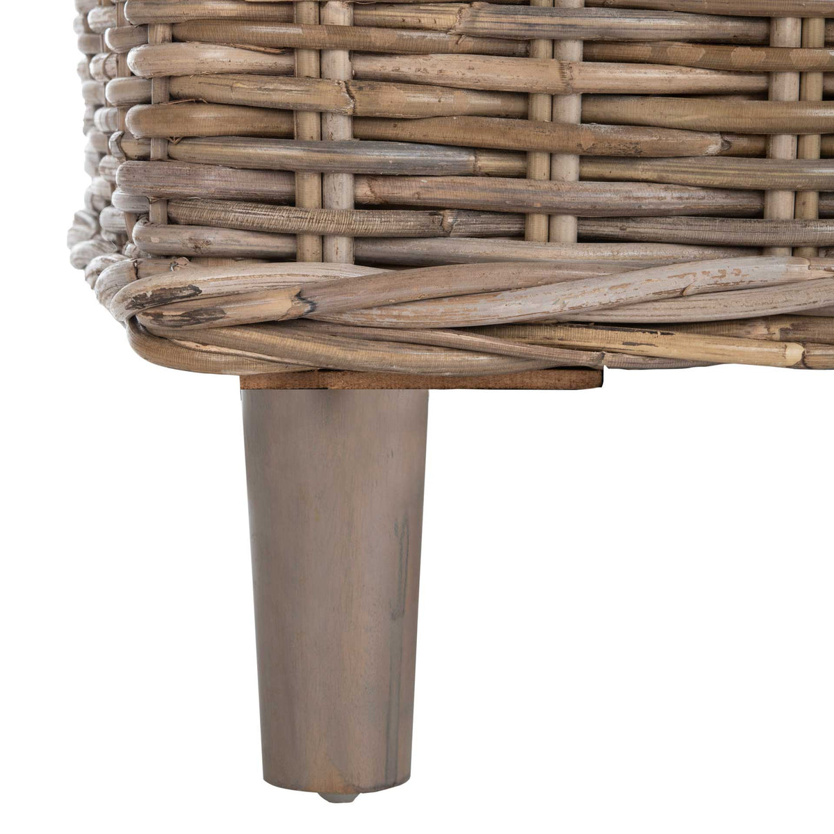 A tapered gray-brown wooden leg supports the pale woven rattan frame.