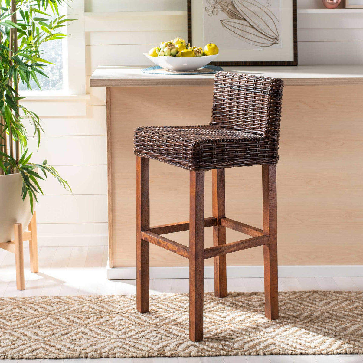 Richly woven brown rattan adds warmth and coastal texture to a casual breakfast bar.
