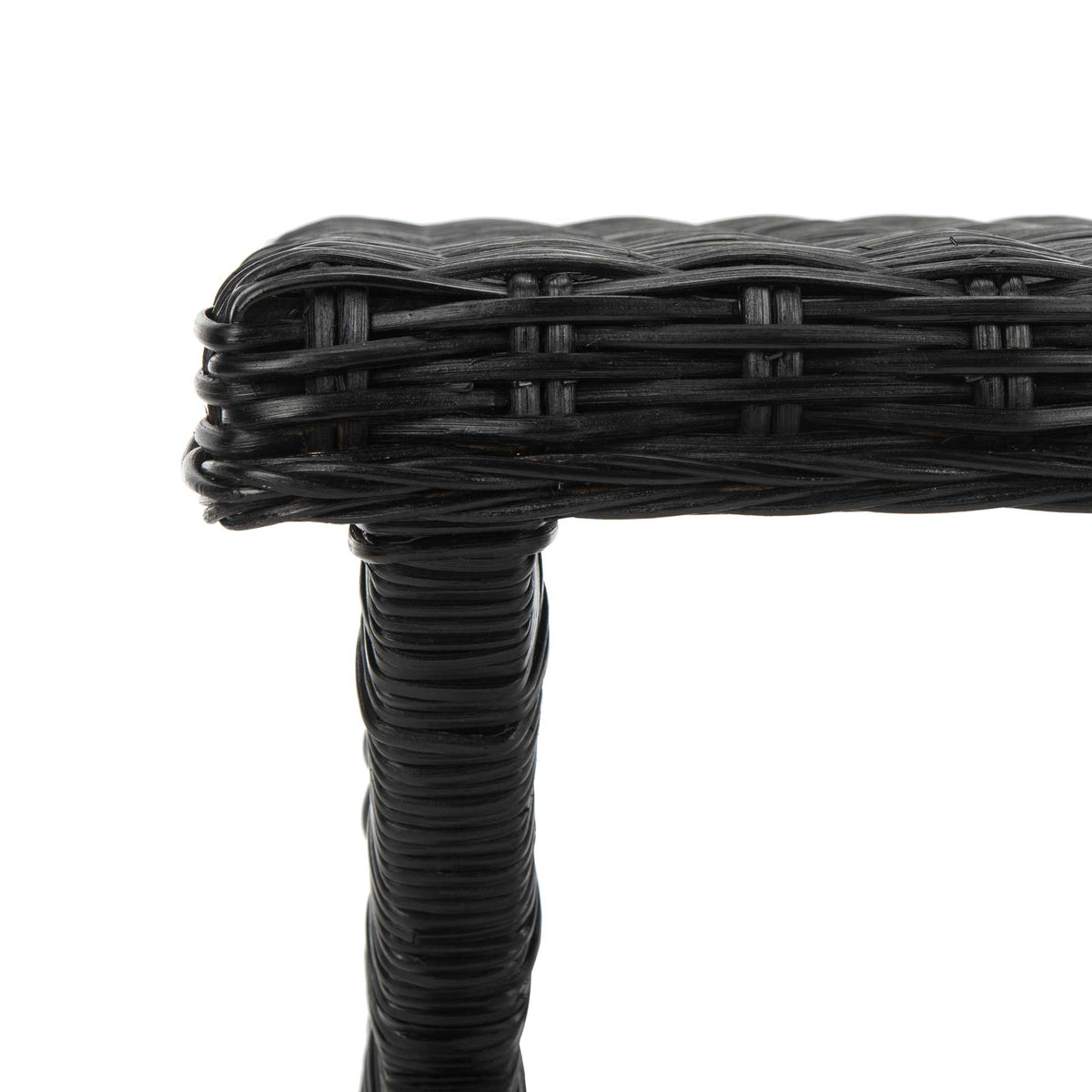 Closely woven black seat edging meets a tightly wrapped support.