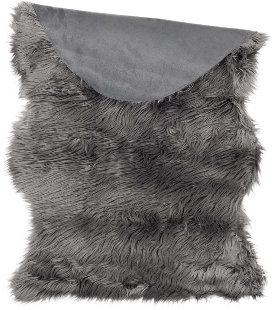 Smooth gray suede-like backing contrasts with the rug's long, soft faux fur
