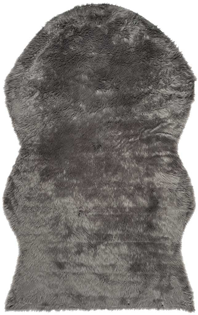 Dense gray faux-fur rug with rounded contours and subtle shifts in its plush pile