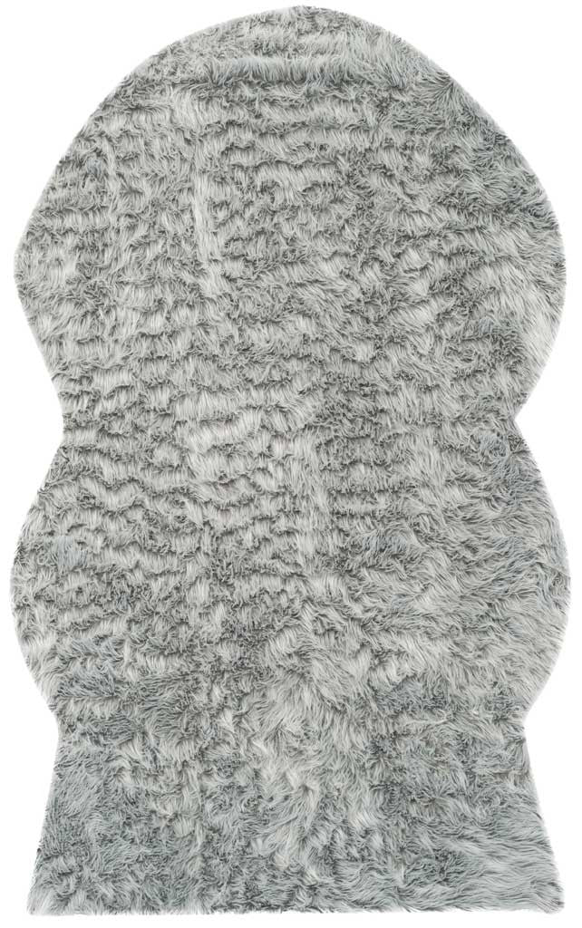 Silvery gray shag rug with soft, wavy pile across a hide-inspired silhouette