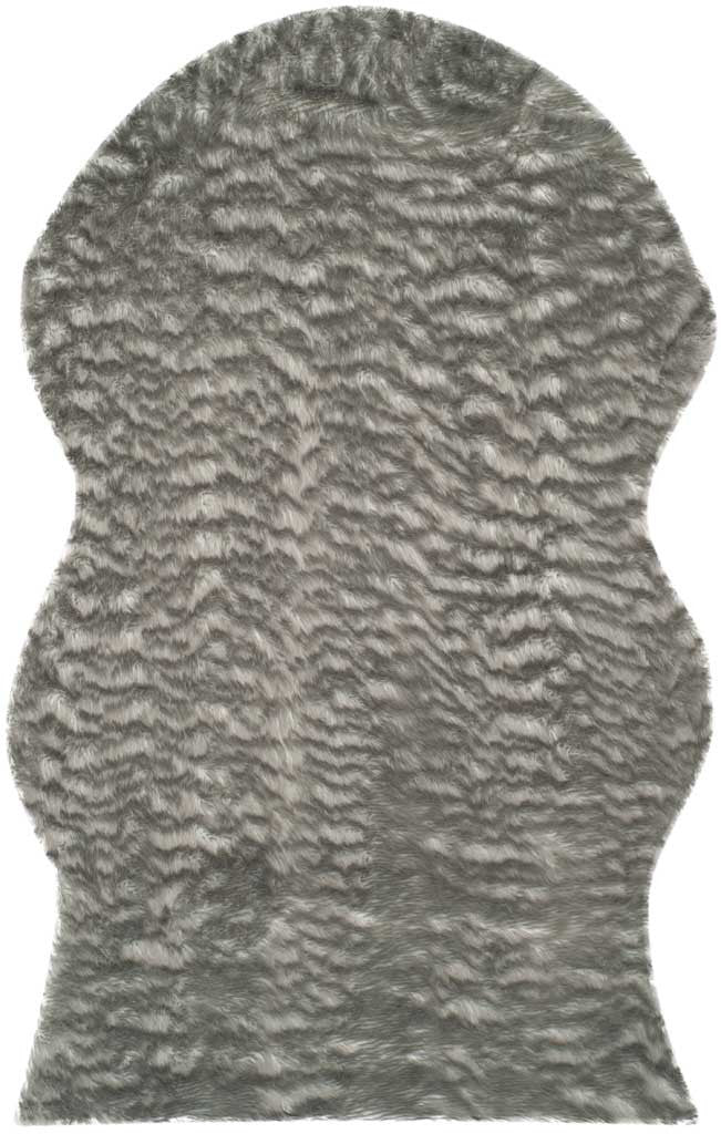 Charcoal gray faux-fur rug with a rounded silhouette and soft, rippling pile